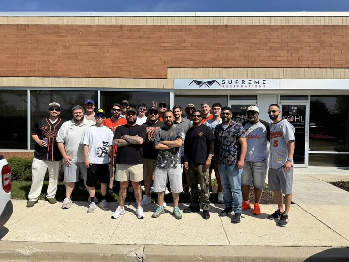The full Supreme Restorations crew outside the Middle River, Maryland headquarters