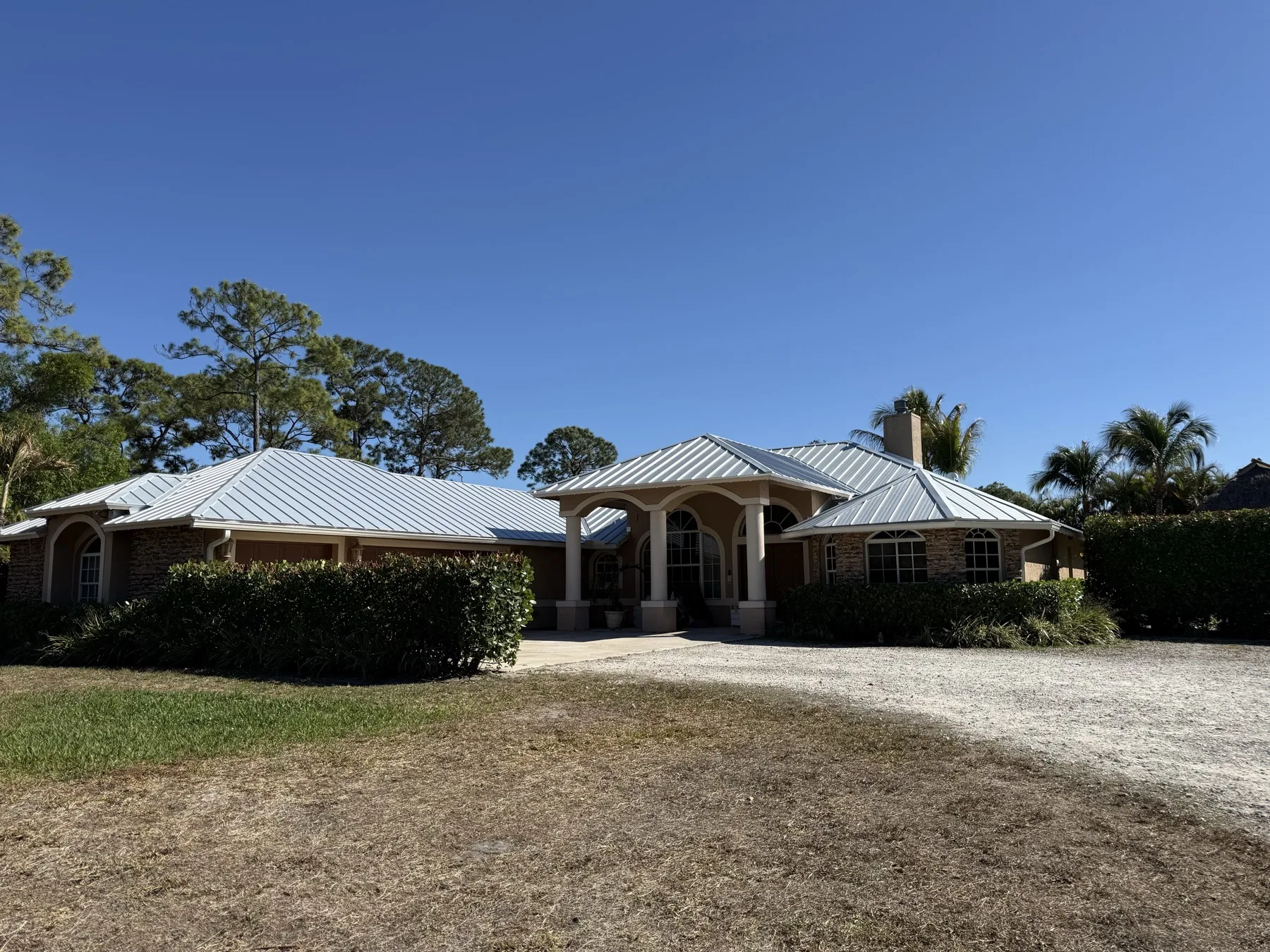 Florida shingle to standing seam metal roof replacement. After