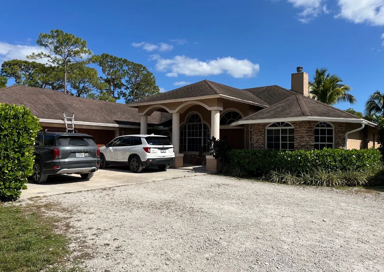 Florida shingle to standing seam metal roof replacement. Before